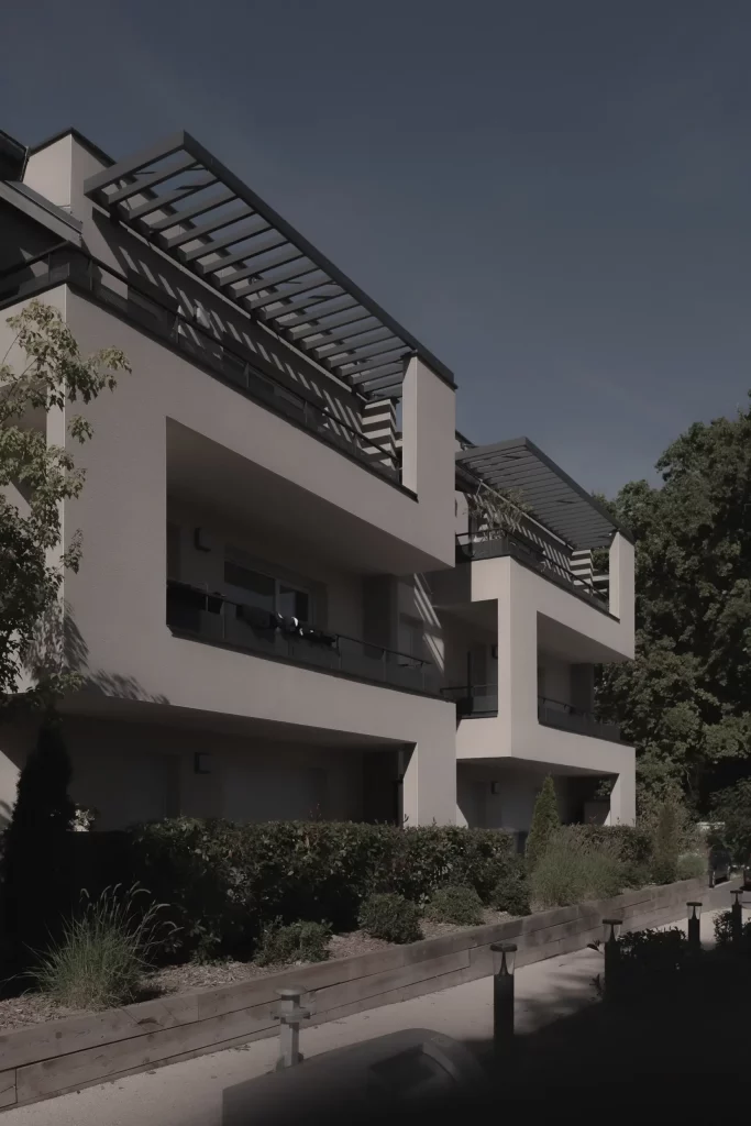 Vue extérieure d'un bâtiment résidentiel avec architecture contemporaine, offrant des logements aidés avec des finitions modernes